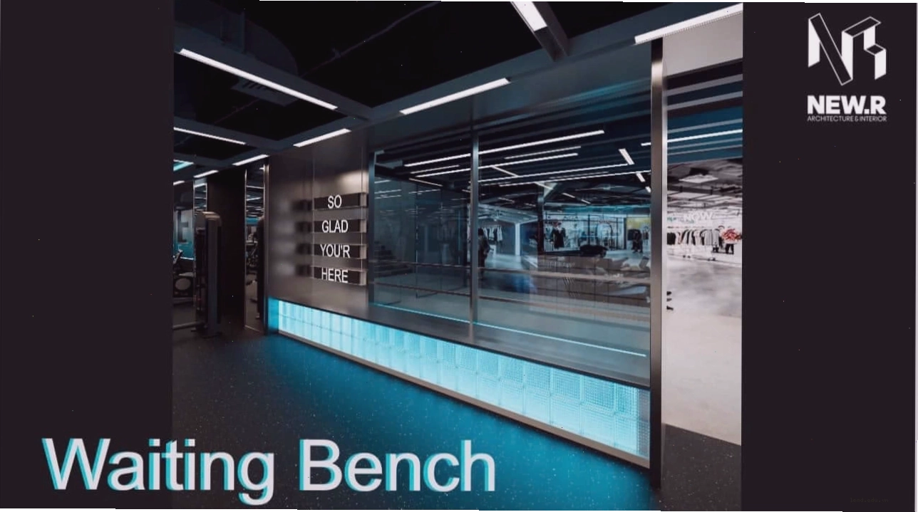 Hai người đàn ông trong phòng gym, một người đang nâng tạ, người còn lại theo dõi và cổ vũ, thể hiện tinh thần gym bro