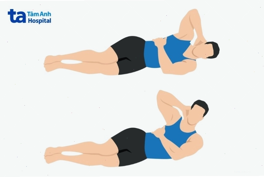 Người đang thực hiện bài tập gập bụng nghiêng (side crunch)