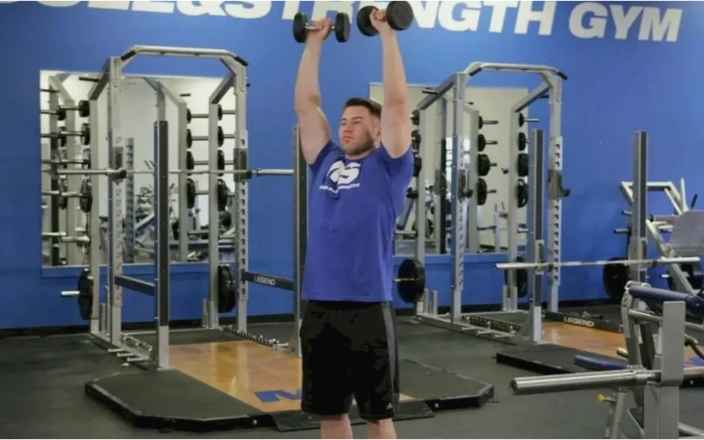 Standing Dumbbell Front Raise - Nâng tạ ra phía trước tập trung vào cơ vai trước